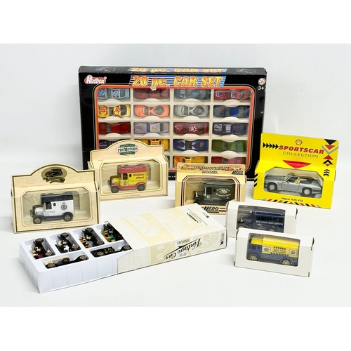 717 - A collection of model cars. A Redbox 20 piece Car Set etc.