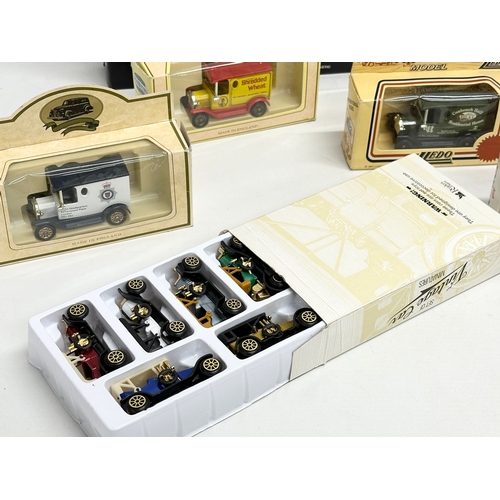 717 - A collection of model cars. A Redbox 20 piece Car Set etc.