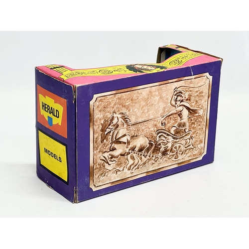 584 - A Britains Herald Models Roman Chariot with box. 19x9x13cm