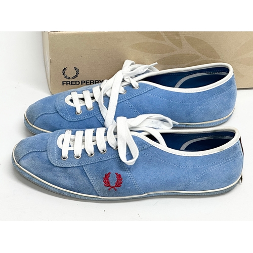 525G - A pair of Fred Perry trainers with box. Size 10.