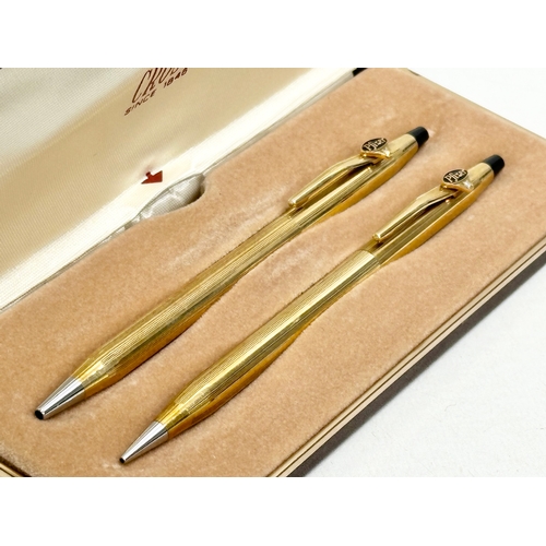 514A - A pair of Cross pens with case.