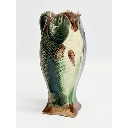 250 - A late 19th century English Majolica 4 sided fish jug. 14x11x22cm