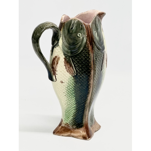 250 - A late 19th century English Majolica 4 sided fish jug. 14x11x22cm