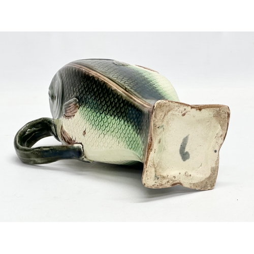 250 - A late 19th century English Majolica 4 sided fish jug. 14x11x22cm