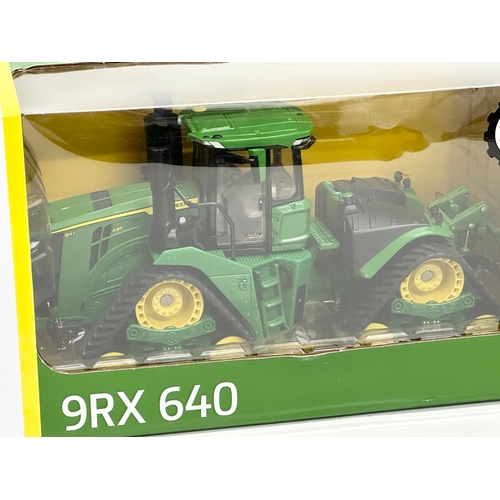 718 - A new large Britains Prestige Collection John Deere 9RX 640 in box. 33x15x16cm