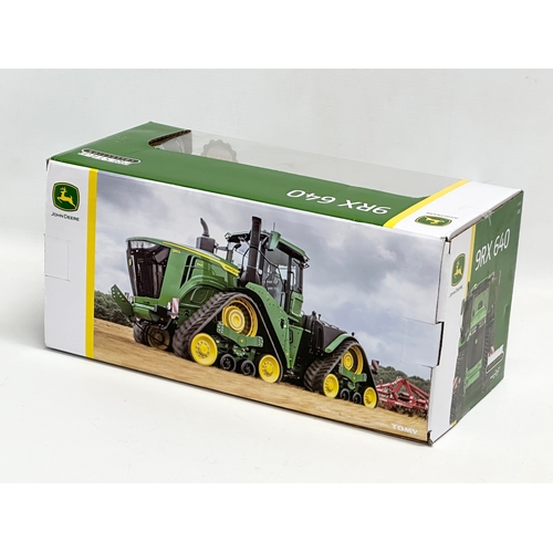 718 - A new large Britains Prestige Collection John Deere 9RX 640 in box. 33x15x16cm