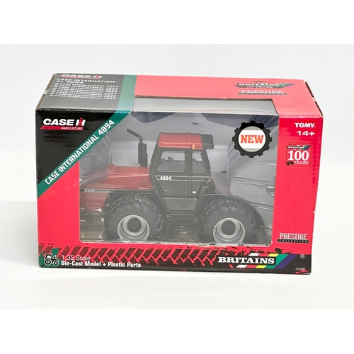 724 - A new Britains Prestige Collection Case International 4894 tractor in box. 25x14x15cm