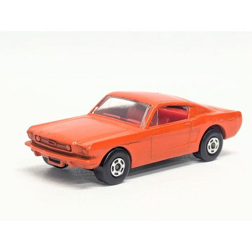 598 - A vintage Matchbox Super fast No. 8, Ford Mustang in red/orange, with original box.