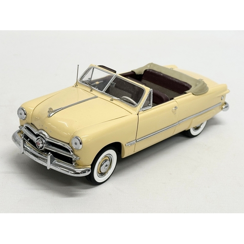 777 - The Danbury Mint 1949 Ford Custom model car with box. Car measures 21cm