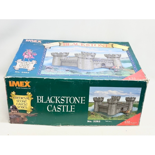 765 - A large unused Imex Model Company INC Medieval Stone Castle Series ‘Blackstone Castle’  with box and... 