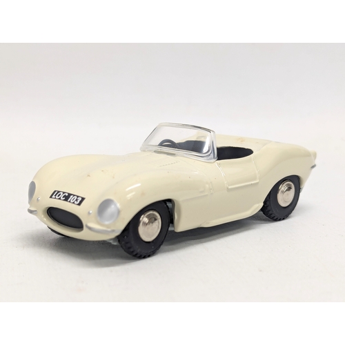 696 - A vintage Norev Spot-on Jaguar XKSS model car. 1/42