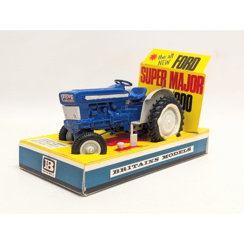 699 - A vintage Britains Ford Super Major 500 Diesel Tractor model.