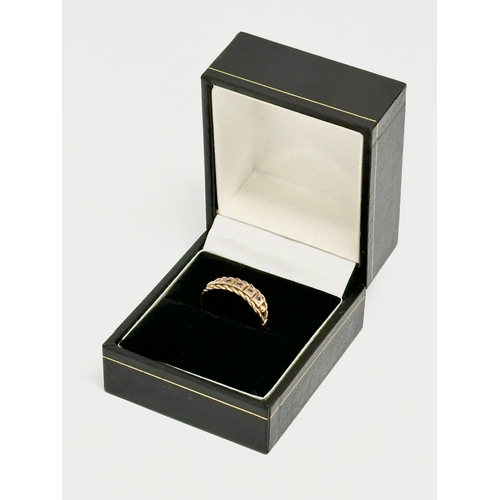 525T - A 9ct gold ladies ring with box. Size L. 1.51 grams.