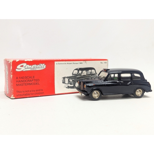 744 - An Austin FX4 Taxi model by Somerville Models 1990. No. 100. 1/43.