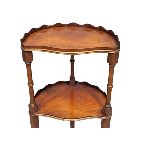 1144 - A small George III style mahogany 2 tier table with gallery and splayed legs.  34x27x71cm(12)