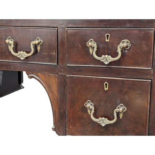 1151 - A good quality early 20th century Chippendale Revival mahogany writing desk with leather top on ball... 