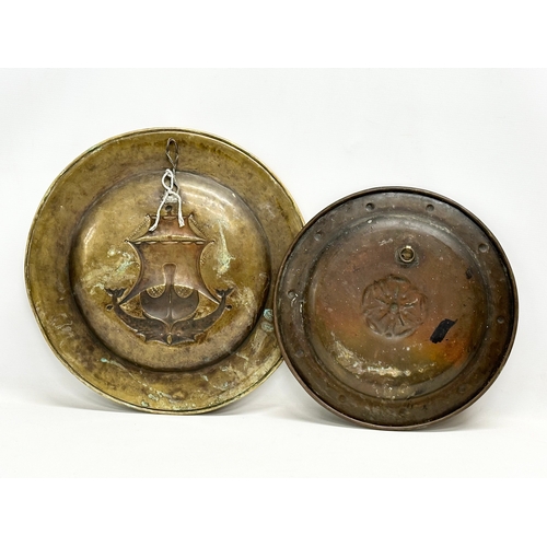 360F - 2 late 19th century brass wall hanging trays. 42cm