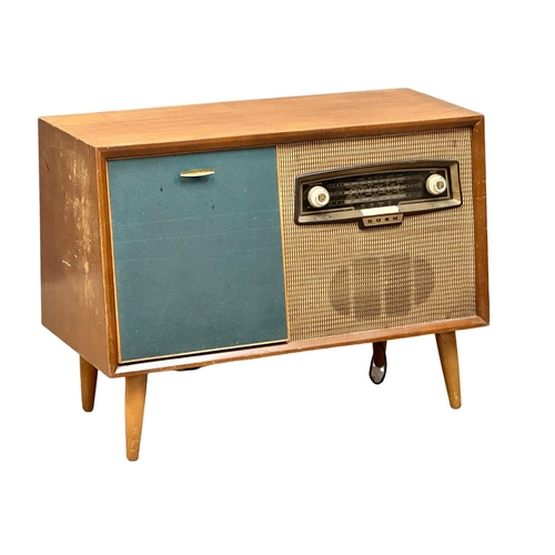 A Mid Century teak Bush radiogram with Gerrard turntable. 84x38x62cm(3)