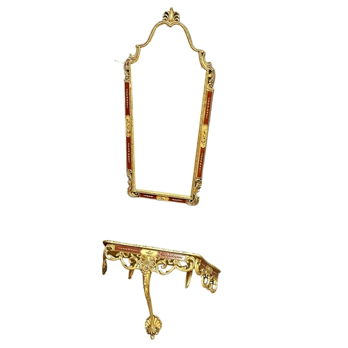 1154 - An ornate brass framed mirror and matching table. Mirror 43x91cm(6)