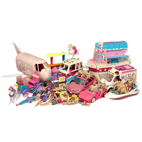 700 - A large collection of Barbie figure and accessories. Barbie airplane, Barbie cars, Barbie speedboat,... 