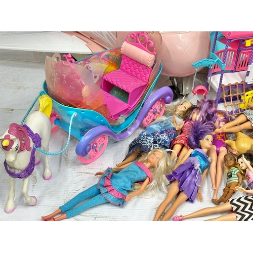 700 - A large collection of Barbie figure and accessories. Barbie airplane, Barbie cars, Barbie speedboat,... 