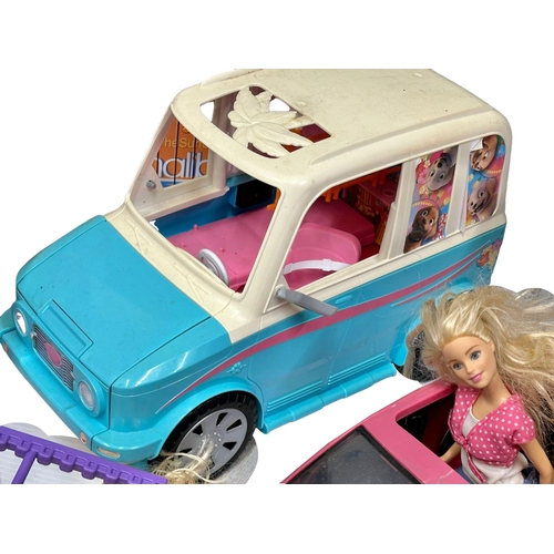 700 - A large collection of Barbie figure and accessories. Barbie airplane, Barbie cars, Barbie speedboat,... 