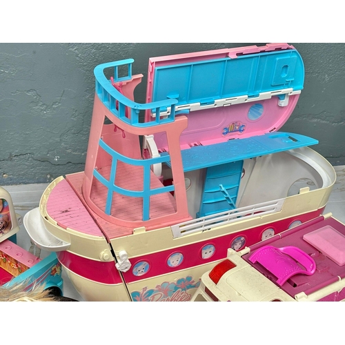 700 - A large collection of Barbie figure and accessories. Barbie airplane, Barbie cars, Barbie speedboat,... 