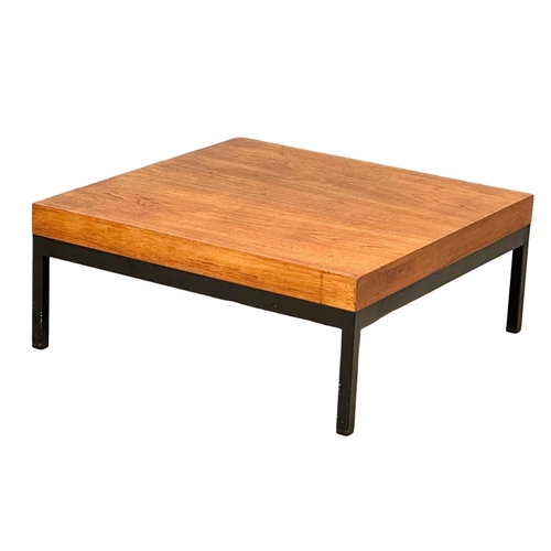 815 - A teak Mid Century style coffee table in the manner of Milo Baughman and Robin Day. 71x71x29cm(1)