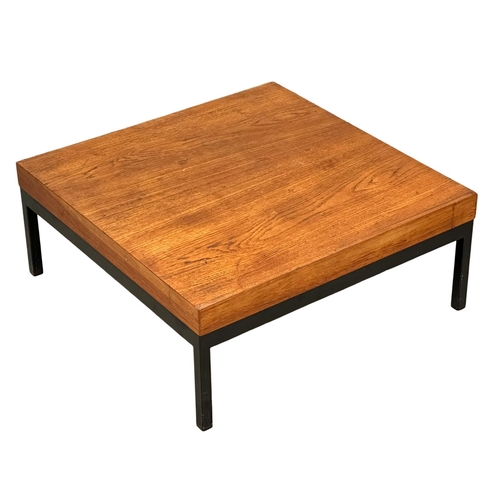 815 - A teak Mid Century style coffee table in the manner of Milo Baughman and Robin Day. 71x71x29cm(1)