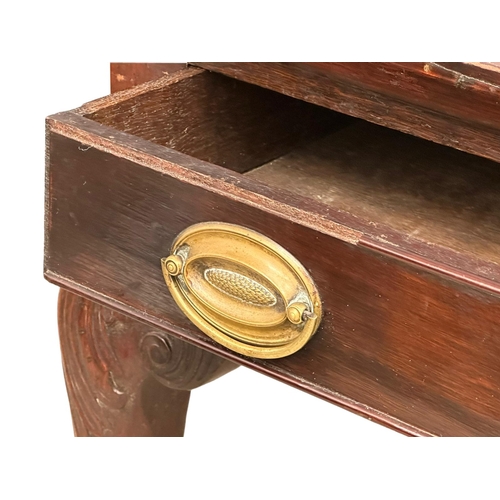 821 - A mid 19th century Irish Chippendale Revival mahogany silver table with drawer on Ball & Claw feet. ... 