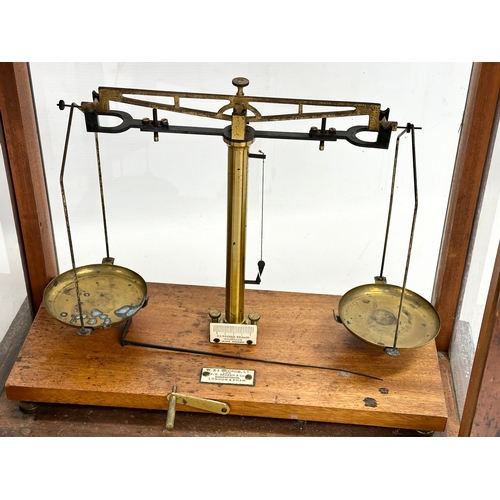 366A - A 1940’s lab balance scales in case. W.& J. George LTD, Late F.E. Becker & Co. 44x26x39cm