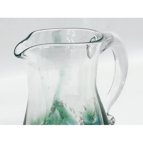 397 - An Irish Art Glass ‘Seascape’ jug by Jerpoint Glass. 14x9x15cm