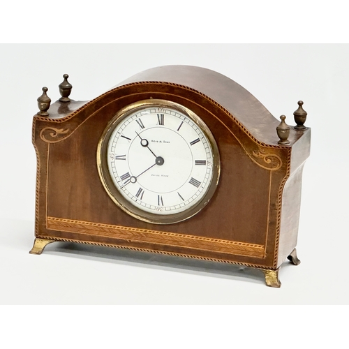 68 - A late 19th/early 20th century inlaid mahogany mantle clock by Reid & Sons. Swiss made. Circa 1890-1... 