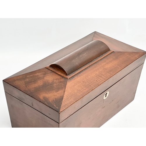 70 - A Regency mahogany sarcophagus tea caddy. Circa 1810. 30x15x16cm