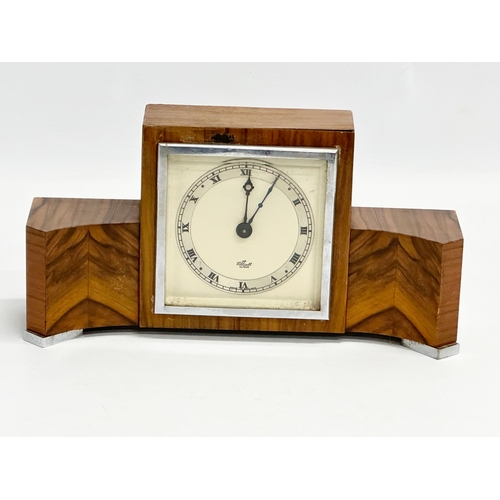 73 - A good quality vintage Art Deco Walnut mantle clock. An Elliot Clock. 25.5x8x13cm