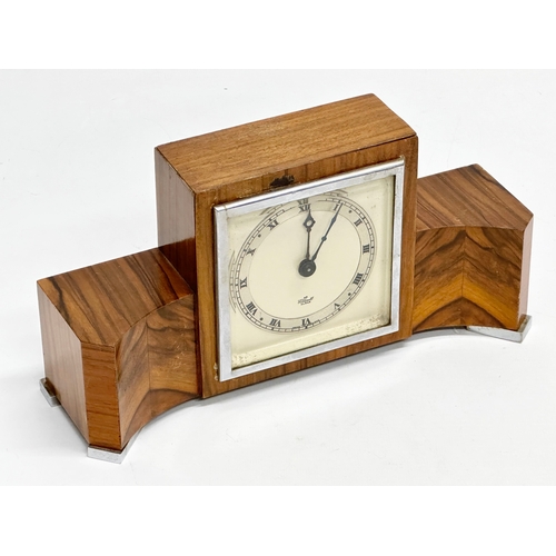 73 - A good quality vintage Art Deco Walnut mantle clock. An Elliot Clock. 25.5x8x13cm