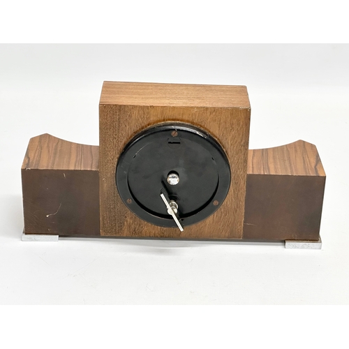 73 - A good quality vintage Art Deco Walnut mantle clock. An Elliot Clock. 25.5x8x13cm