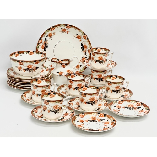 75 - Early Royal Albert. A 28 piece early 20th century Royal Albert tea service. 1905-1920.