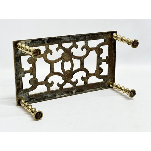 394 - 2 Victorian brass trivet stands and other. 30.5x16.5x11.5cm. Irish clover with paw feet 20x4.5cm