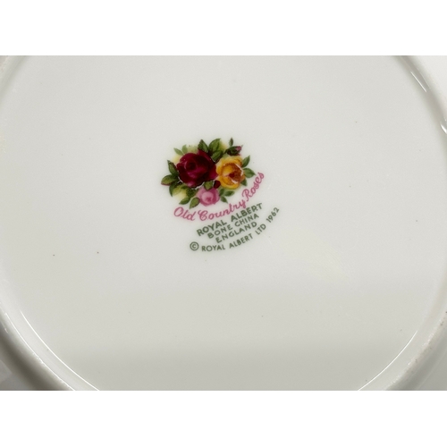 393 - A set of 12 1962 Royal Albert LTD ‘Old Country Roses’ sandwich plates. 16cm