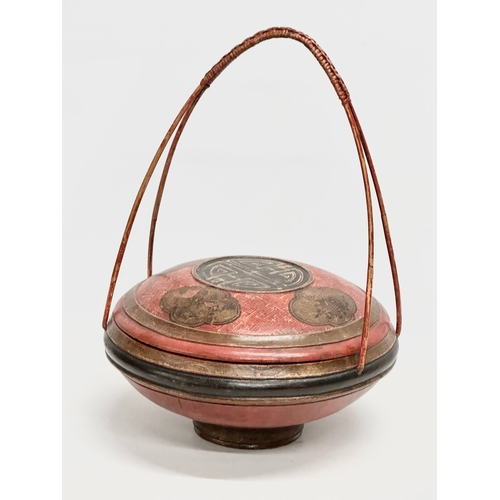 77 - A Chinese rice basket. 34x34x49cm