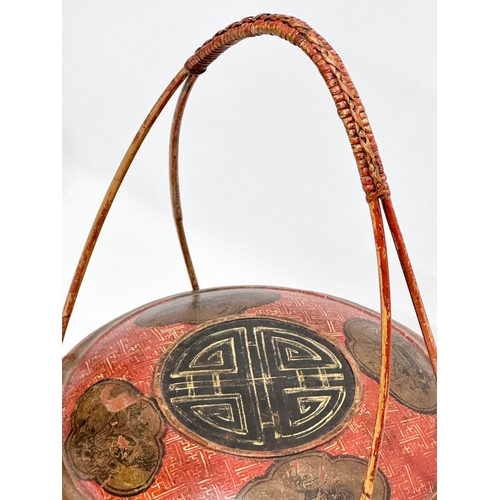 77 - A Chinese rice basket. 34x34x49cm