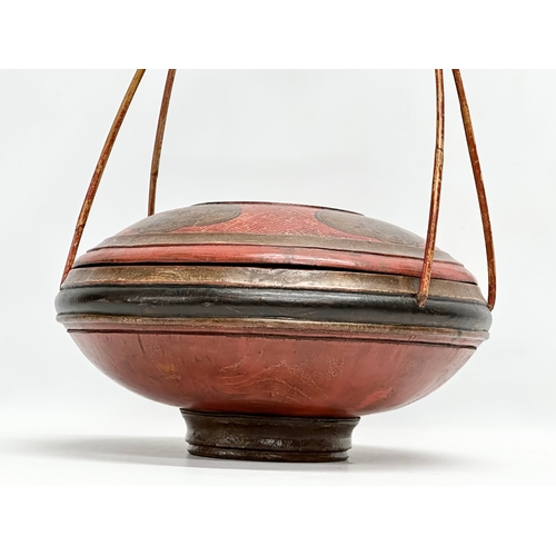 77 - A Chinese rice basket. 34x34x49cm