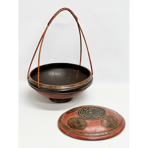 77 - A Chinese rice basket. 34x34x49cm