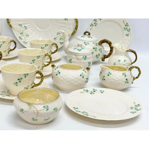 28 - 3rd/4th Period Belleek ‘Shamrock’ tea service.  A 25 piece Belleek tea service. Including a black st... 