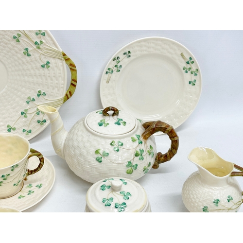 28 - 3rd/4th Period Belleek ‘Shamrock’ tea service.  A 25 piece Belleek tea service. Including a black st... 