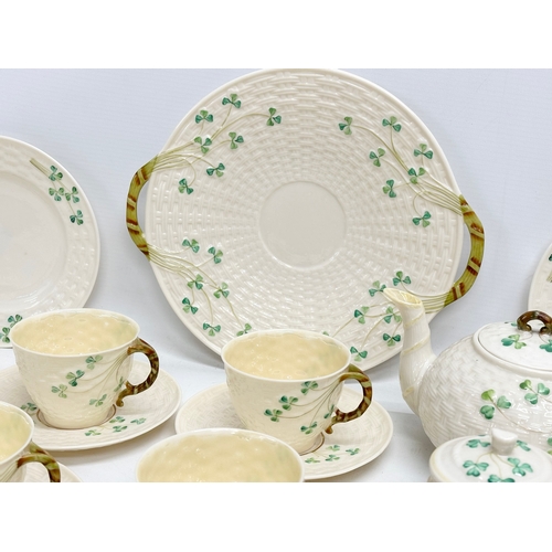 28 - 3rd/4th Period Belleek ‘Shamrock’ tea service.  A 25 piece Belleek tea service. Including a black st... 