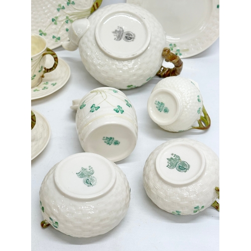 28 - 3rd/4th Period Belleek ‘Shamrock’ tea service.  A 25 piece Belleek tea service. Including a black st... 