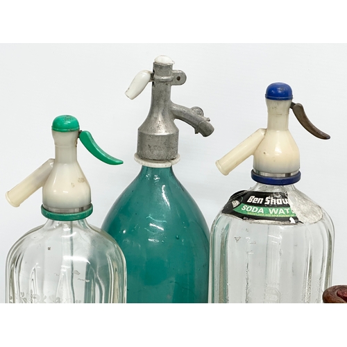 388 - A collection of vintage soda siphons and ink bottles. A Ben Shaw & Sons Soda Water 33.5cm. Mineral W... 