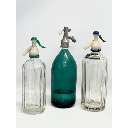 388 - A collection of vintage soda siphons and ink bottles. A Ben Shaw & Sons Soda Water 33.5cm. Mineral W... 